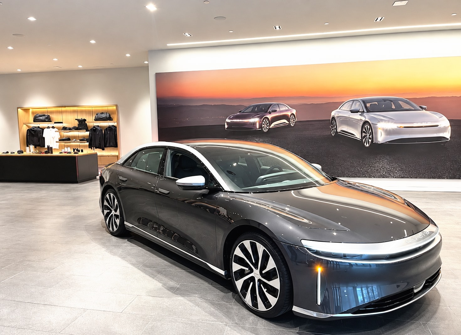 A Lucid sedan on a showroom floor.